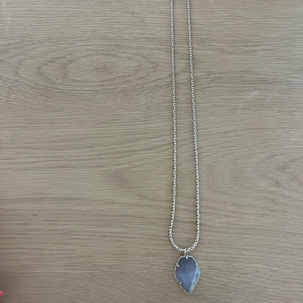 Kendra Scott tear drop necklace in silver and quart blue